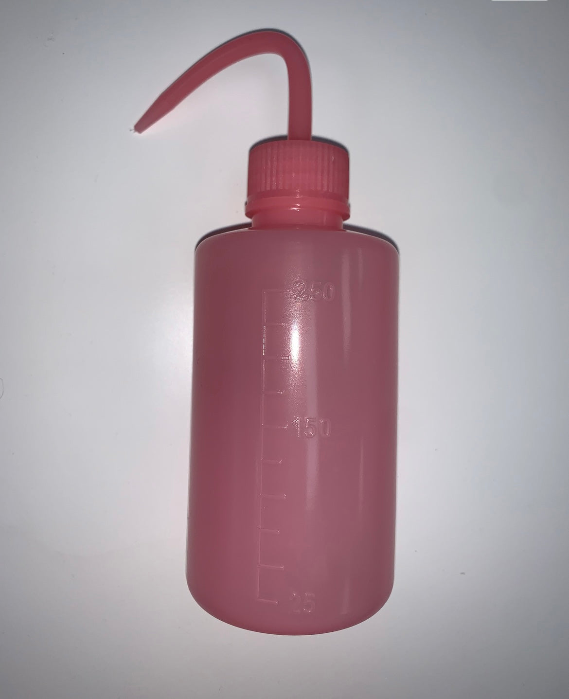 Pink rinse bottle